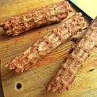 Ещё горячими быстро скручиваем в трубочку, прижимаем, например, ножом и держим так минуту, чтобы трубочка зафиксировалась. Лучше это делать с помощником, но я так часто делаю вафли, что справляюсь одна!